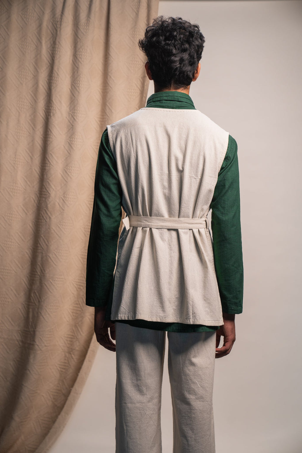 Unisex Vest at Kamakhyaa by Lafaani. This item is 100% pure cotton, Casual Wear, Embroidered, Jackets, Kora, Natural with azo dyes, Organic, Regular Fit, Rewind, Solids, Undyed and Unbleached, Unisex, Womenswear