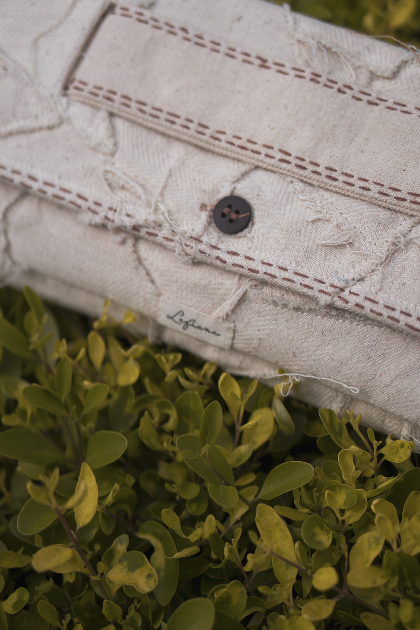 Upcycled Envelope Clutch at Kamakhyaa by Lafaani. This item is 100% pure cotton, Bags, Casual Wear, Clutch, Kora, Materiality, Organic, Regular Fit, Solids, Undyed and Unbleached, Upcycled