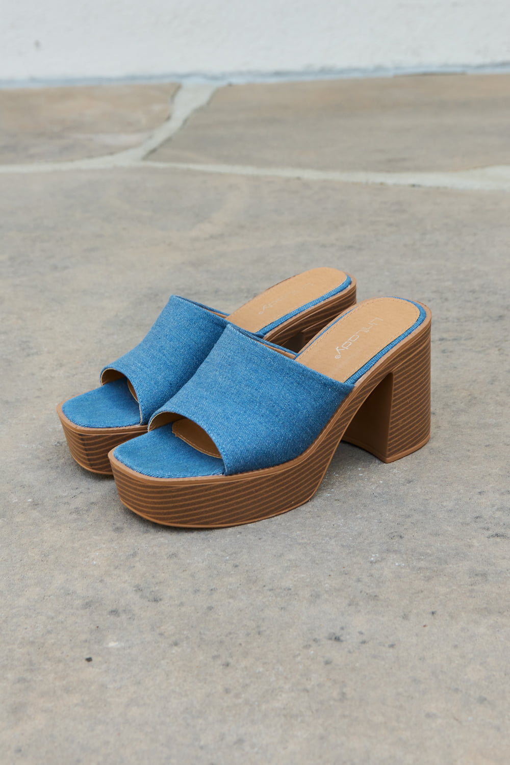 Weeboo Essential Platform Heel Sandals at Kamakhyaa by Wee Boo. This item is Blue, Casual Wear, Denim, Heels, Mules, Off-Season Mega Sale, Open Toes, PU Leather, Regular Fit, Solids, Trendsi