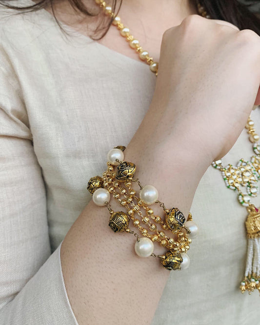 White Bracelet Suvarna at Kamakhyaa by House Of Heer. This item is Add Ons, Alloy Metal, Beaded Jewellery, Bracelets, Festive Jewellery, Festive Wear, Free Size, jewelry, July Sale, July Sale 2023, Less than $50, Natural, Pearl, Textured, White