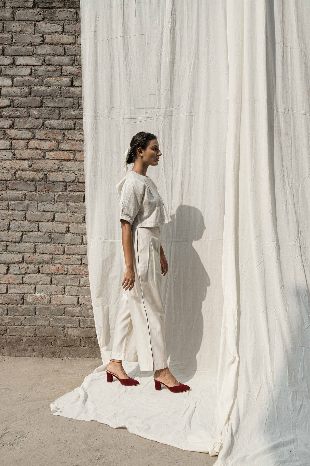 White Classic Pants at Kamakhyaa by Ahmev. This item is Casual Wear, Chanderi, Ink And Ivory, Natural, Pants, Prints, Relaxed Fit, White, Womenswear