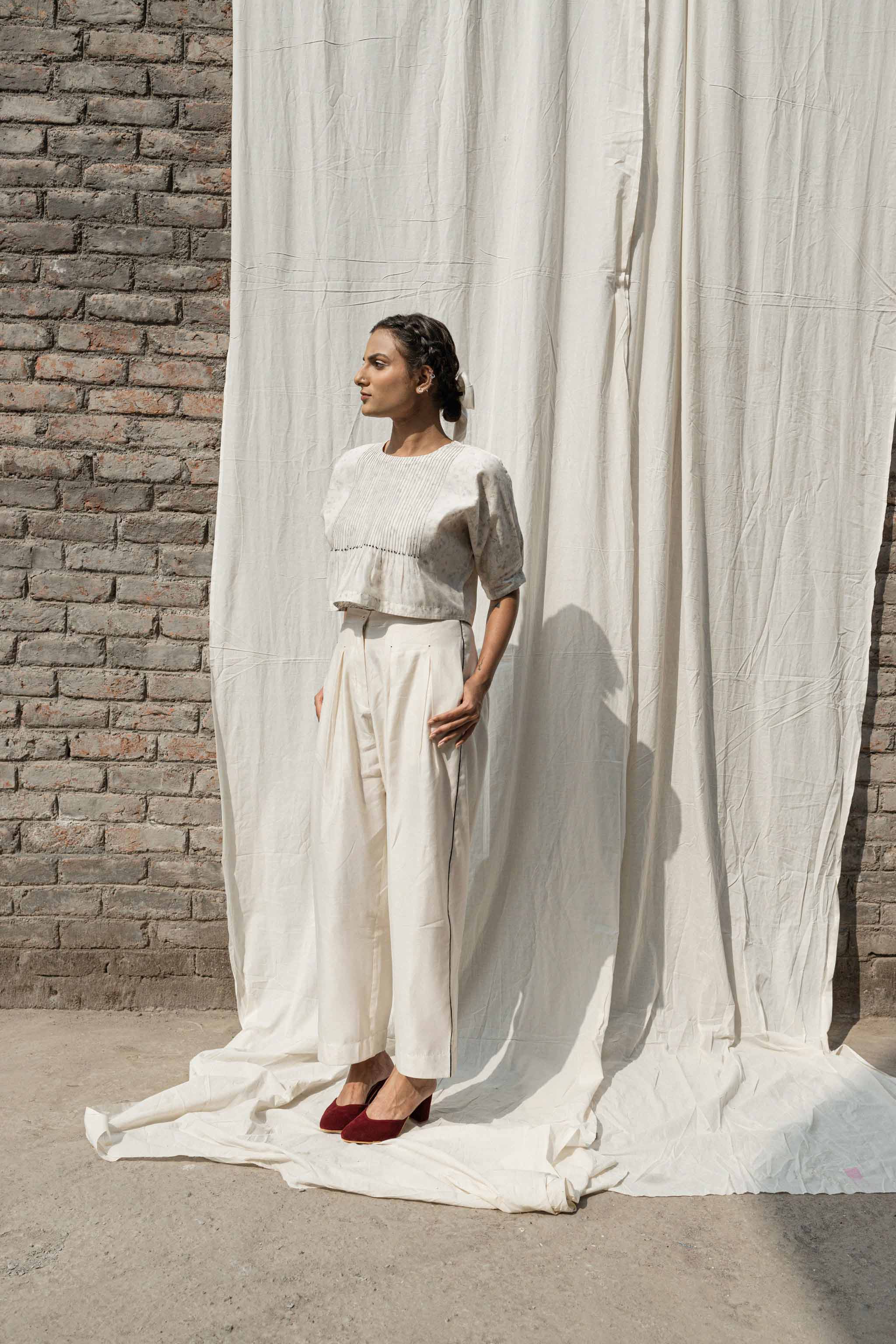 White Classic Pants at Kamakhyaa by Ahmev. This item is Casual Wear, Chanderi, Ink And Ivory, Natural, Pants, Prints, Relaxed Fit, White, Womenswear