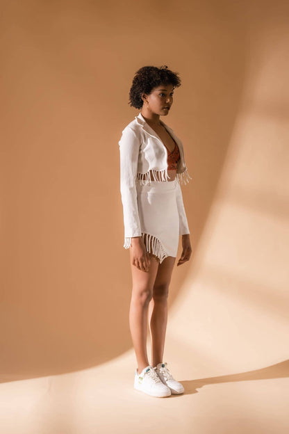 White Co-ord 2-Piece Set at Kamakhyaa by Meko Studio. This item is Co-Ord Sets, Cotton, Deadstock Fabrics, Fusion Wear, July Sale, July Sale 2023, Lycra, Regular Fit, Skirt Sets, Solids, Vacation, Vacation Co-ords, Verao SS-22/23, White, Womenswear