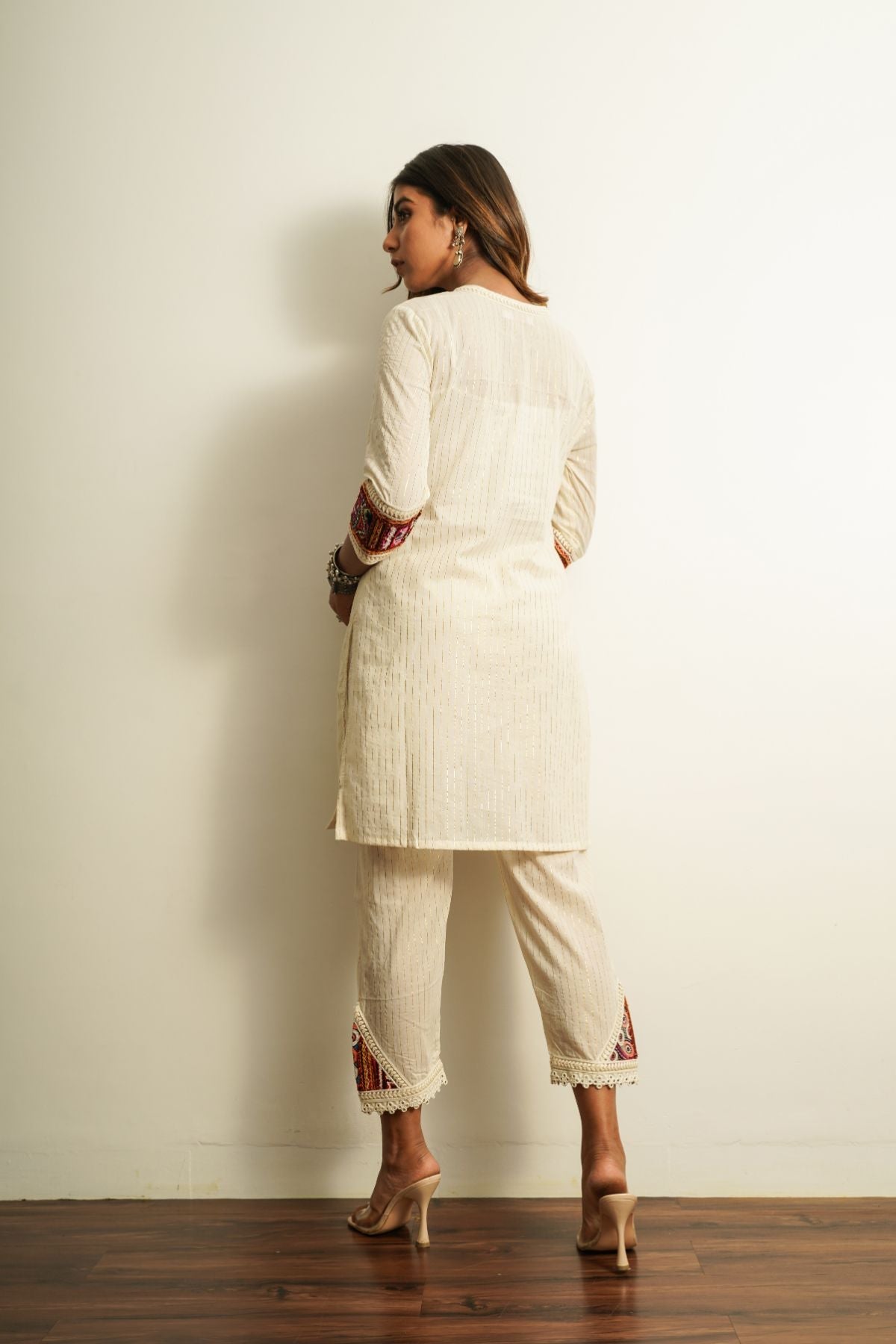 White Cotton Embroidered Pant at Kamakhyaa by Keva. This item is 100% cotton, Best Selling, Capris, Fusion Wear, Less than $50, Natural, New, Off-white, Regular Fit, Saba, Solids, White, Womenswear