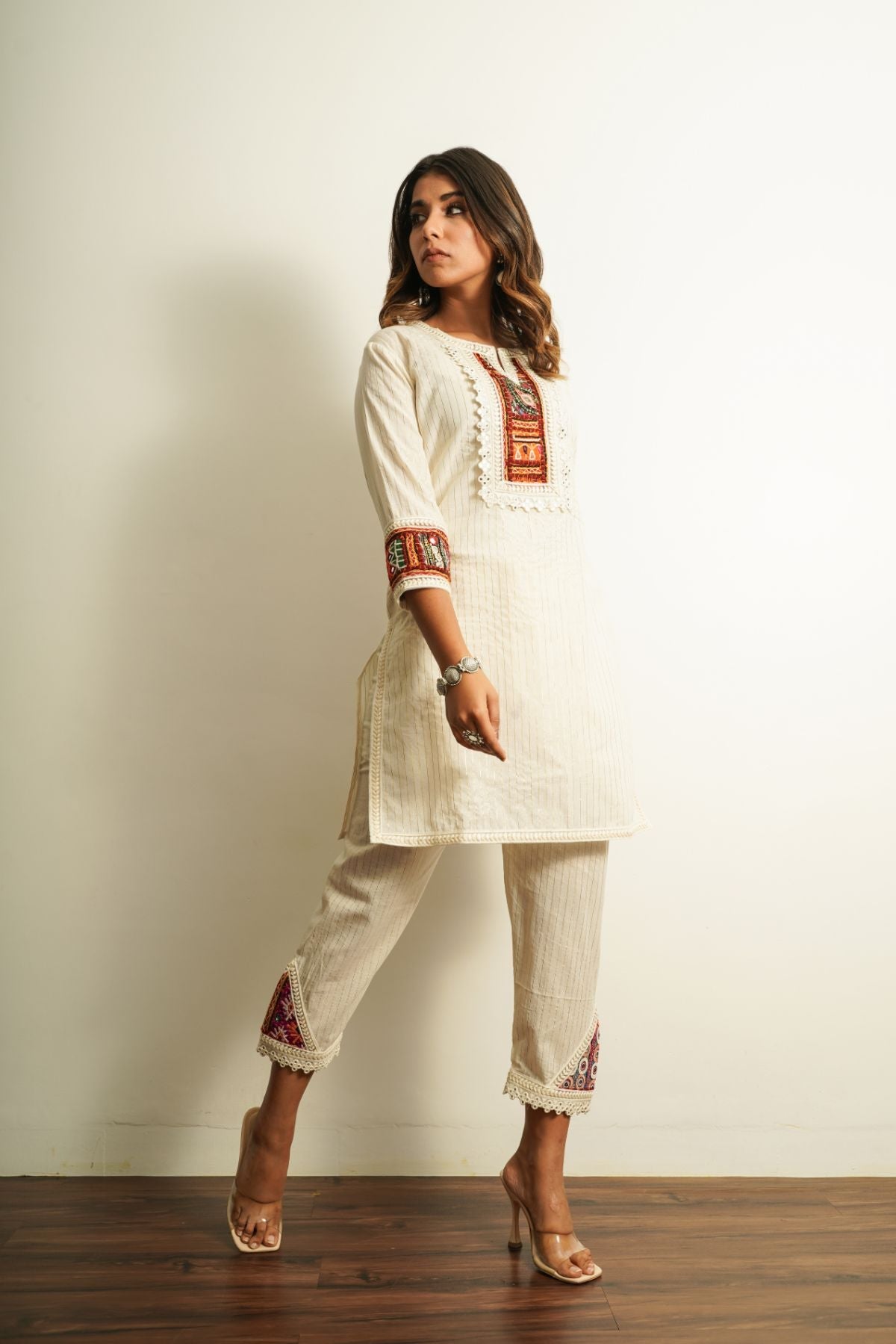 White Cotton Embroidered Pant at Kamakhyaa by Keva. This item is 100% cotton, Best Selling, Capris, Fusion Wear, Less than $50, Natural, New, Off-white, Regular Fit, Saba, Solids, White, Womenswear