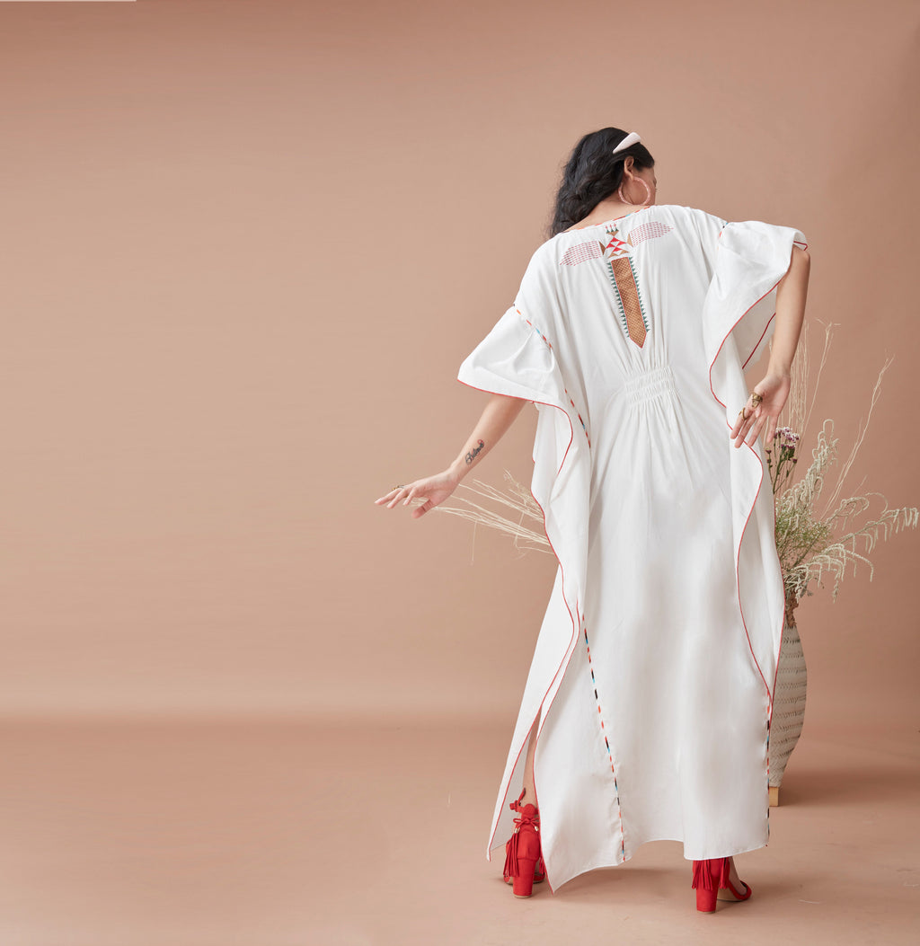 White Cotton Kaftan at Kamakhyaa by Dan Ba. This item is Cotton, July Sale, July Sale 2023, Kaftans, Maxi Dresses, Natural, Prints, Relaxed Fit, Resort Wear, White, Womenswear