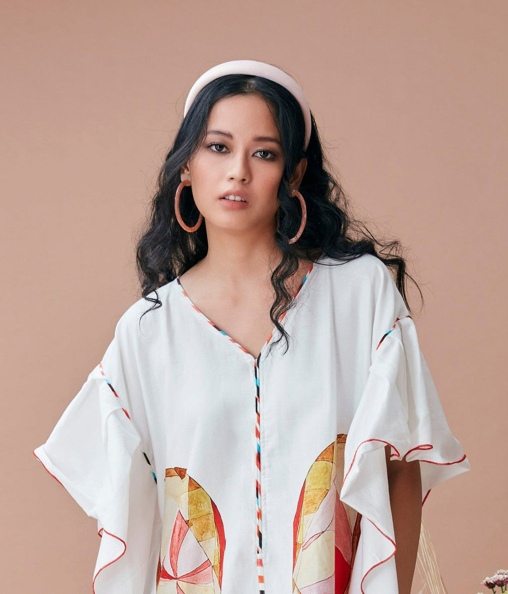 White Cotton Kaftan at Kamakhyaa by Dan Ba. This item is Cotton, July Sale, July Sale 2023, Kaftans, Maxi Dresses, Natural, Prints, Relaxed Fit, Resort Wear, White, Womenswear