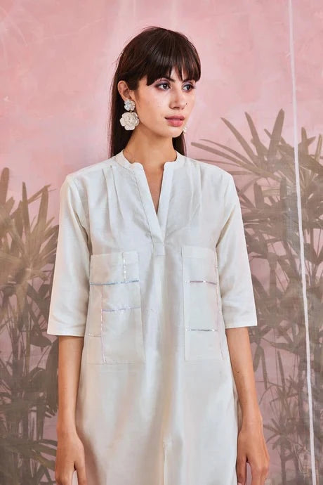 White Cotton Kurta Pant Set at Kamakhyaa by Charkhee. This item is Aasmaa, Chanderi, Cotton, Embellished, Indian Wear, Kurta Pant Sets, Natural, Organza, Relaxed Fit, Sequin work, Wedding Wear, White, Womenswear