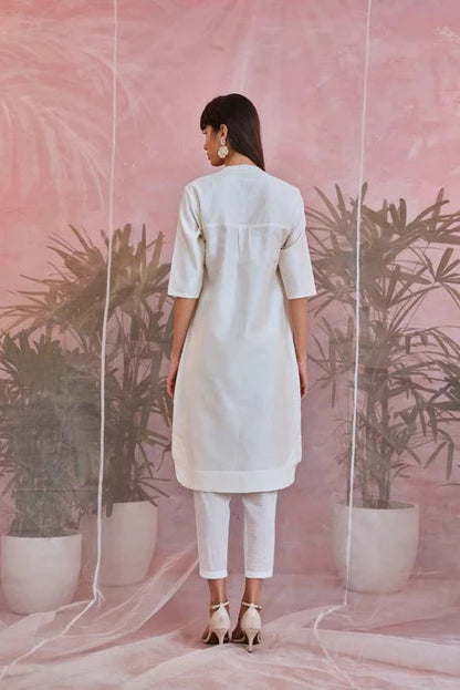 White Cotton Kurta Pant Set at Kamakhyaa by Charkhee. This item is Aasmaa, Chanderi, Cotton, Embellished, Indian Wear, Kurta Pant Sets, Natural, Organza, Relaxed Fit, Sequin work, Wedding Wear, White, Womenswear