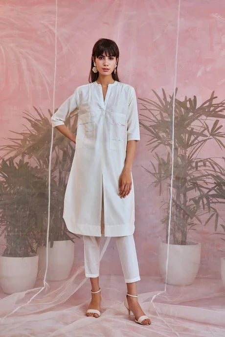 White Cotton Kurta Pant Set at Kamakhyaa by Charkhee. This item is Aasmaa, Chanderi, Cotton, Embellished, Indian Wear, Kurta Pant Sets, Natural, Organza, Relaxed Fit, Sequin work, Wedding Wear, White, Womenswear