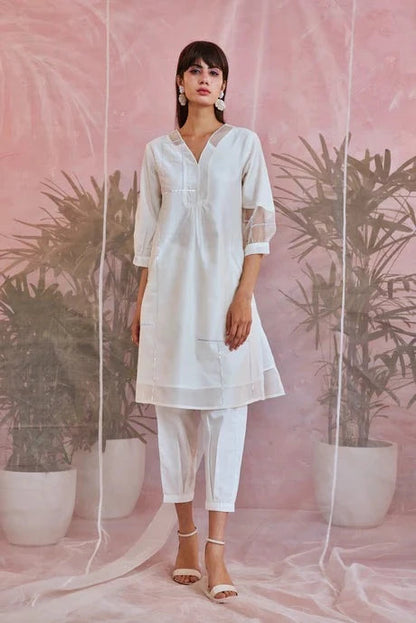 White Cotton Kurta Set With Organza Dupatta at Kamakhyaa by Charkhee. This item is Aasmaa, Chanderi, Cotton, Embellished, Indian Wear, Kurta Pant Sets, Kurta Set With Dupatta, Natural, Organza, Relaxed Fit, Sequin work, Wedding Wear, White, Womenswear