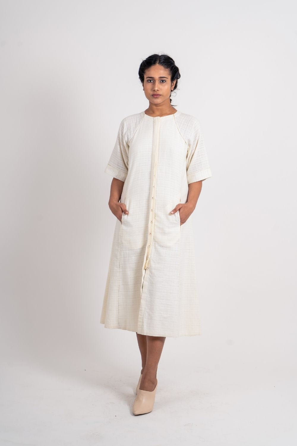 White Cotton Midi Dress at Kamakhyaa by Ahmev. This item is Casual Wear, Handloom Cotton, July Sale, July Sale 2023, Midi Dresses, Natural, Regular Fit, Shirt Dresses, Shirts, Textured, White, Womenswear