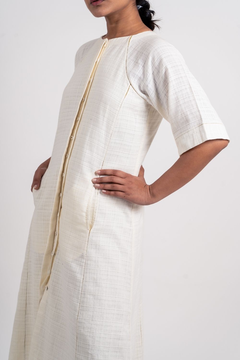 White Cotton Midi Dress at Kamakhyaa by Ahmev. This item is Casual Wear, Handloom Cotton, July Sale, July Sale 2023, Midi Dresses, Natural, Regular Fit, Shirt Dresses, Shirts, Textured, White, Womenswear