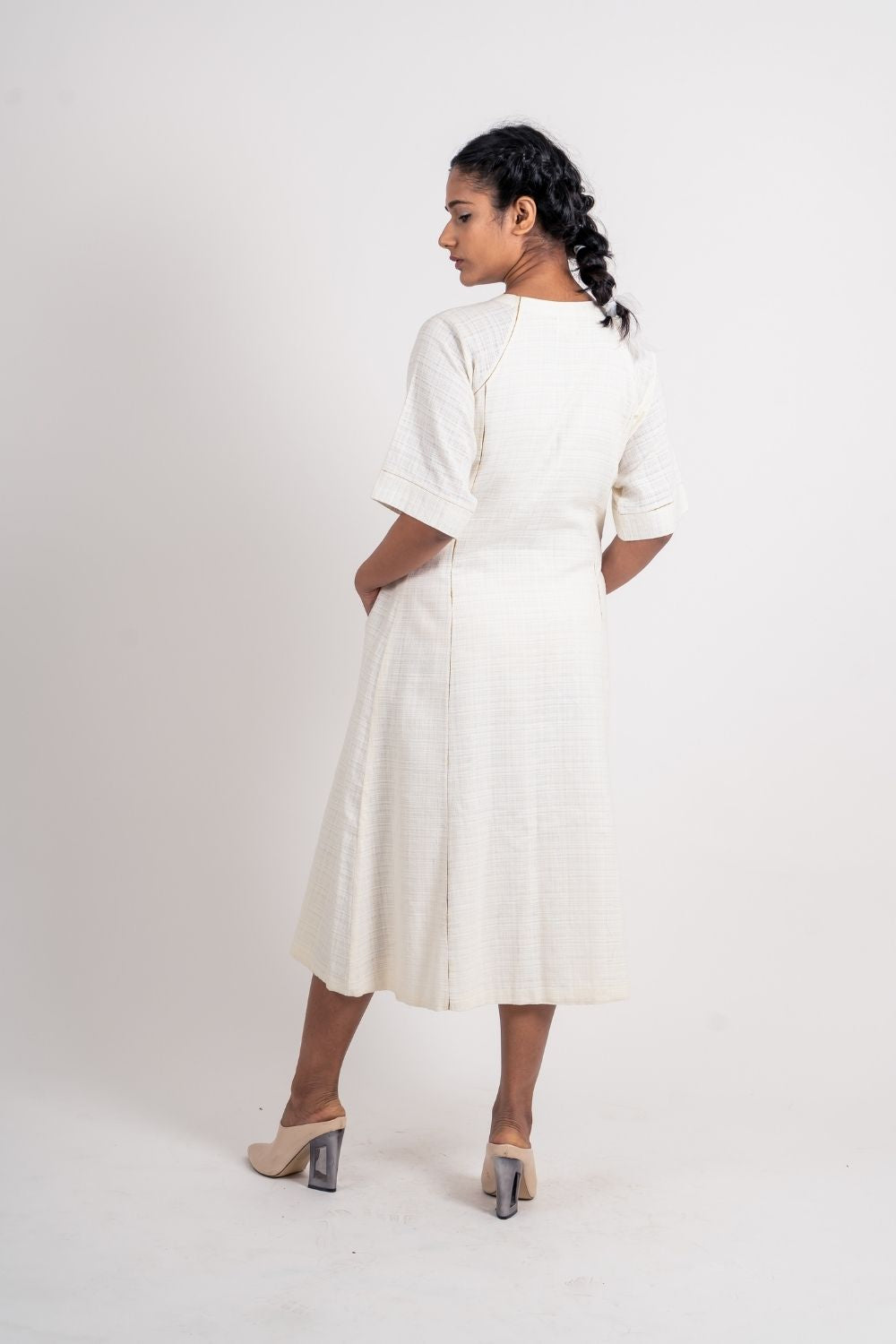 White Cotton Midi Dress at Kamakhyaa by Ahmev. This item is Casual Wear, Handloom Cotton, July Sale, July Sale 2023, Midi Dresses, Natural, Regular Fit, Shirt Dresses, Shirts, Textured, White, Womenswear