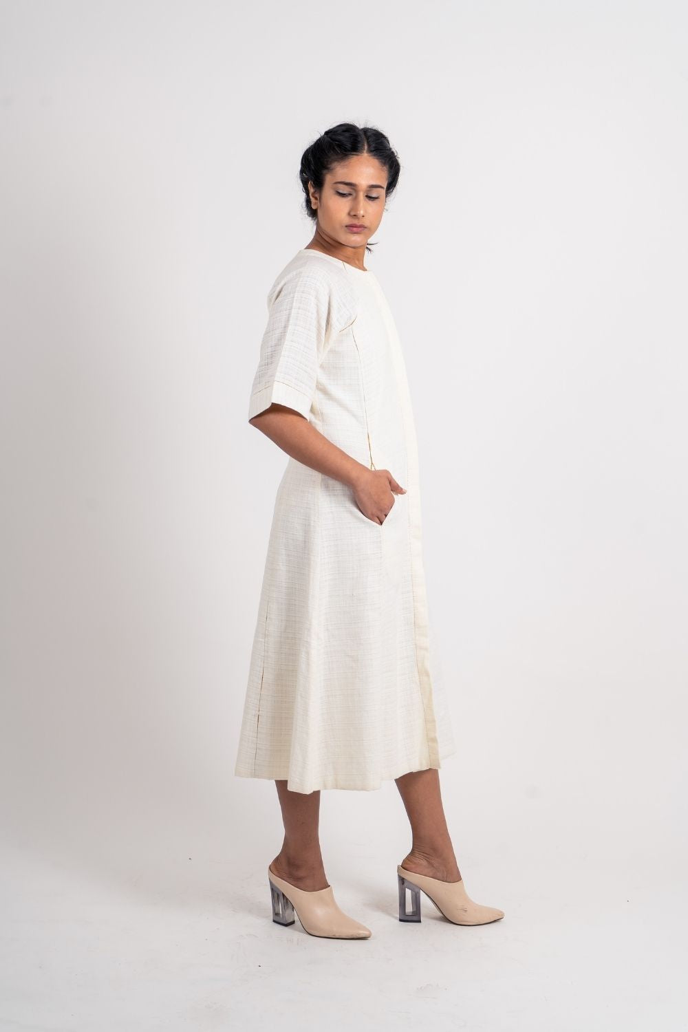 White Cotton Midi Dress at Kamakhyaa by Ahmev. This item is Casual Wear, Handloom Cotton, July Sale, July Sale 2023, Midi Dresses, Natural, Regular Fit, Shirt Dresses, Shirts, Textured, White, Womenswear