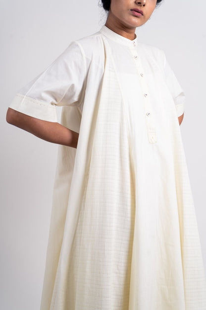 White Cotton Midi Dress at Kamakhyaa by Ahmev. This item is Casual Wear, Handloom Cotton, July Sale, July Sale 2023, Midi Dresses, Natural, Relaxed Fit, Solids, White, Womenswear