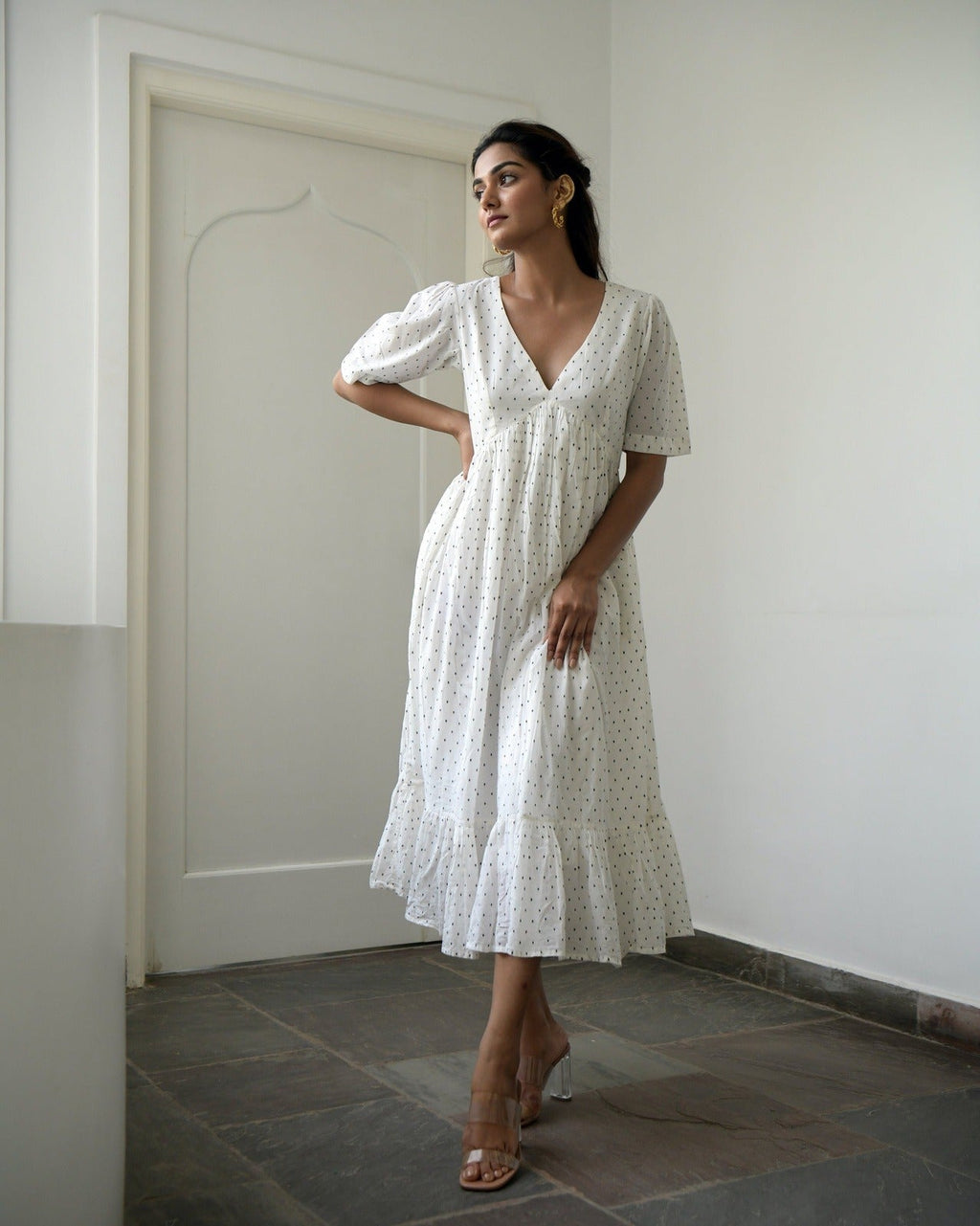 White Cotton Midi Dress at Kamakhyaa by Taro. This item is Best Selling, Evening Wear, FB ADS JUNE, Handwoven cotton, Indo-Western, July Sale, July Sale 2023, Kurtas, Midi Dresses, Natural, Prints, Regular Fit, Tiered Dresses, White, Wildflower Taro, Womenswear
