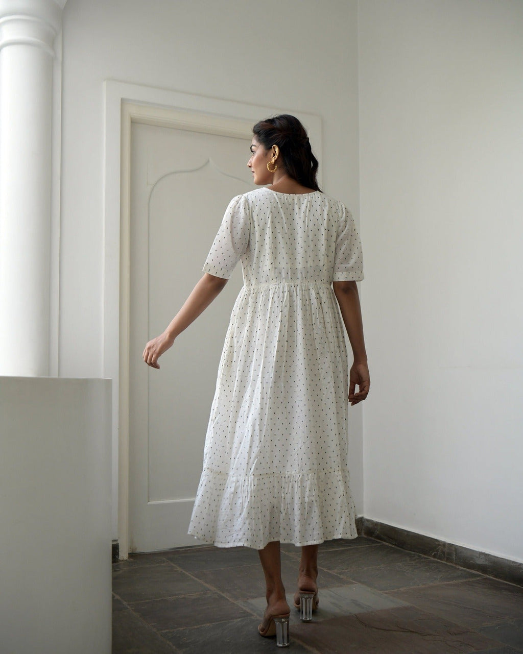 White Cotton Midi Dress at Kamakhyaa by Taro. This item is Best Selling, Evening Wear, FB ADS JUNE, Handwoven cotton, Indo-Western, July Sale, July Sale 2023, Kurtas, Midi Dresses, Natural, Prints, Regular Fit, Tiered Dresses, White, Wildflower Taro, Womenswear