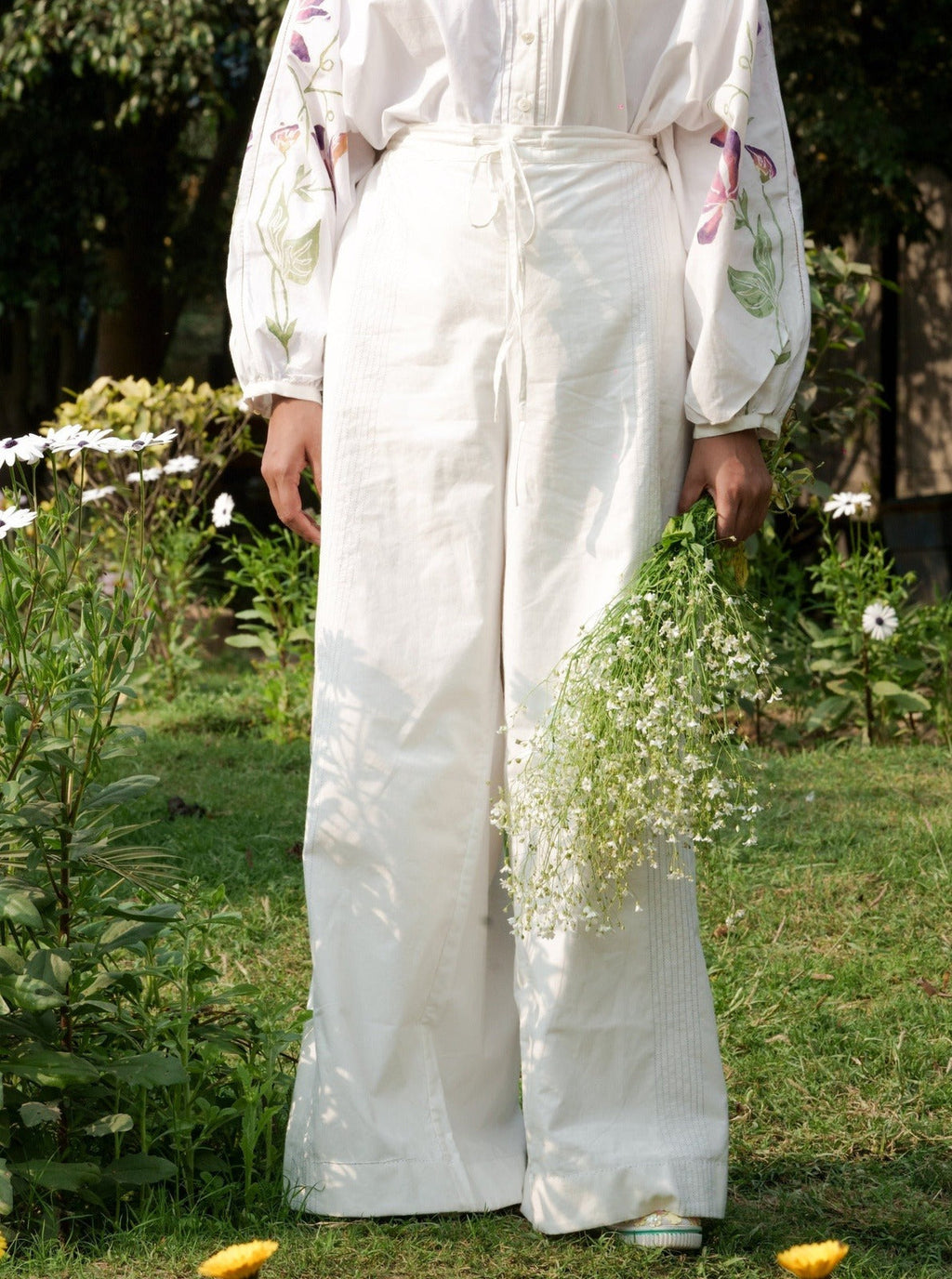 White Cotton Pants at Kamakhyaa by Rias Jaipur. This item is 100% Cotton, Casual wear, Natural, RE 2.O, Regular, Rias JaipurBottoms, solids, Unisex, White, Womenswear