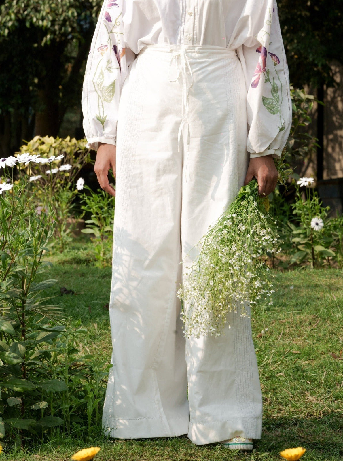 White Cotton Pants at Kamakhyaa by Rias Jaipur. This item is 100% Cotton, Casual wear, Natural, RE 2.O, Regular, Rias JaipurBottoms, solids, Unisex, White, Womenswear