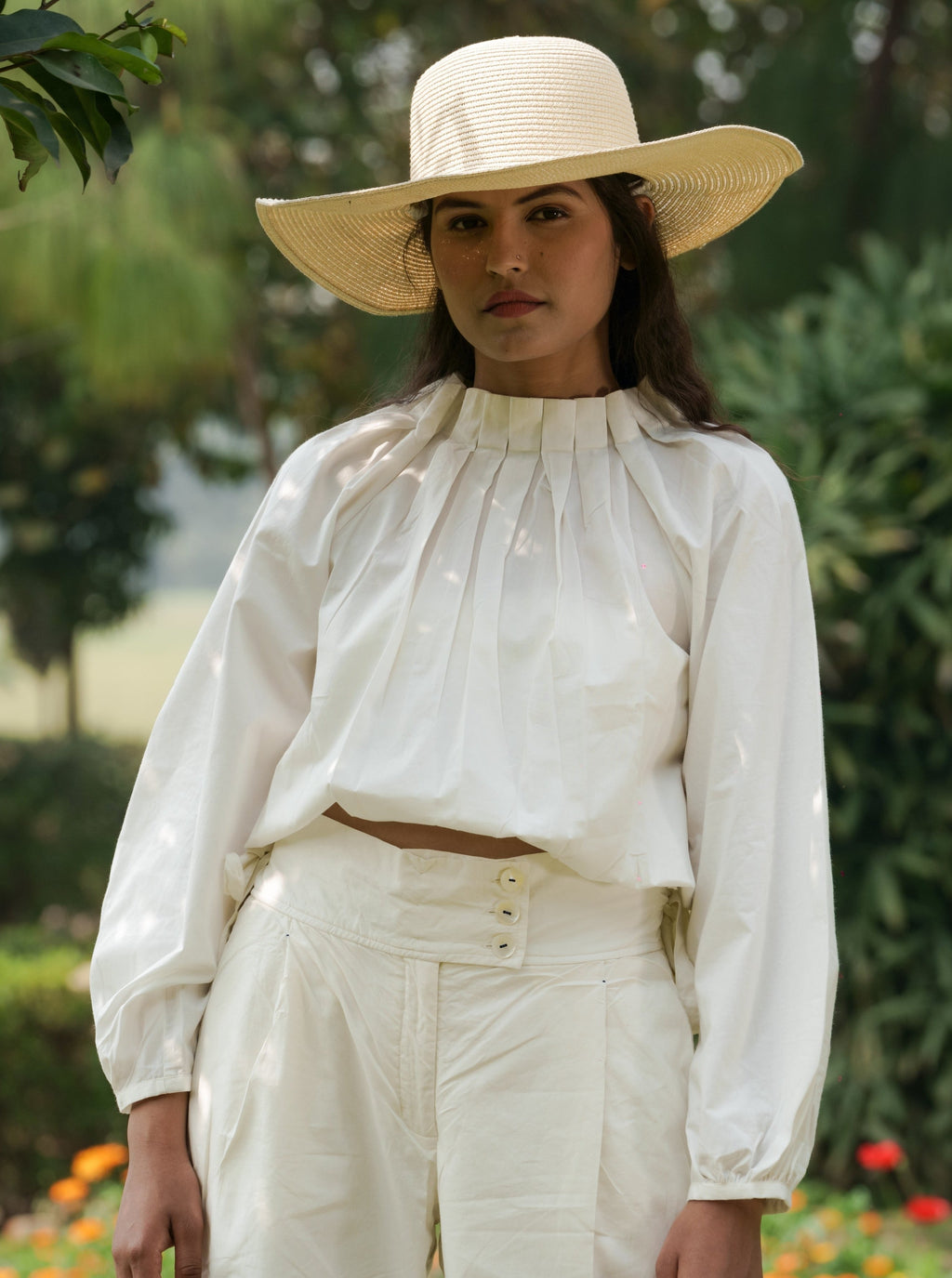 White Cotton Pleated Top at Kamakhyaa by Ahmev. This item is Casual Wear, Cotton, Crop Tops, July Sale, July Sale 2023, Natural, Relaxed Fit, Solids, Tops, White, Womenswear