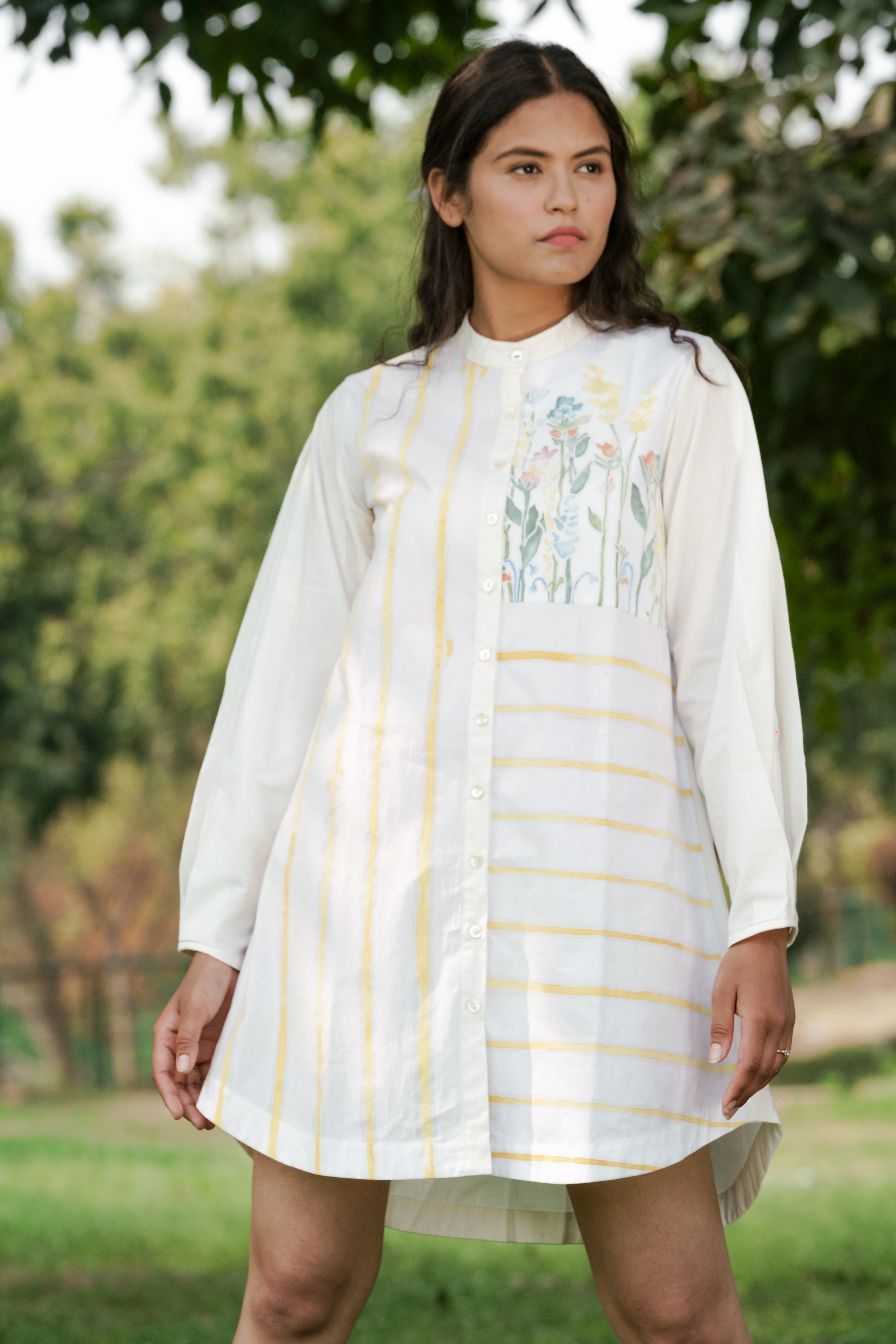 White Cotton Shirt at Kamakhyaa by Ahmev. This item is Batik, Casual Wear, Cotton, FB ADS JUNE, Handpainted, July Sale, July Sale 2023, Natural, Relaxed Fit, Shirt Dresses, Shirts, Stripes, White, Womenswear
