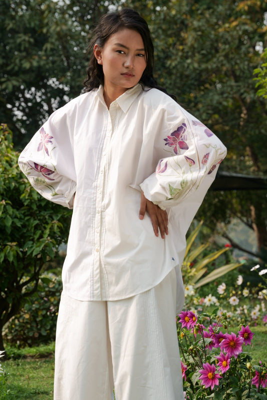 White Cotton Sleeve shirt at Kamakhyaa by Ahmev. This item is Batik, Casual Wear, Cotton, Hanpainted, July Sale, July Sale 2023, Natural, Prints, Regular Fit, Shirts, Tops, White, Womenswear