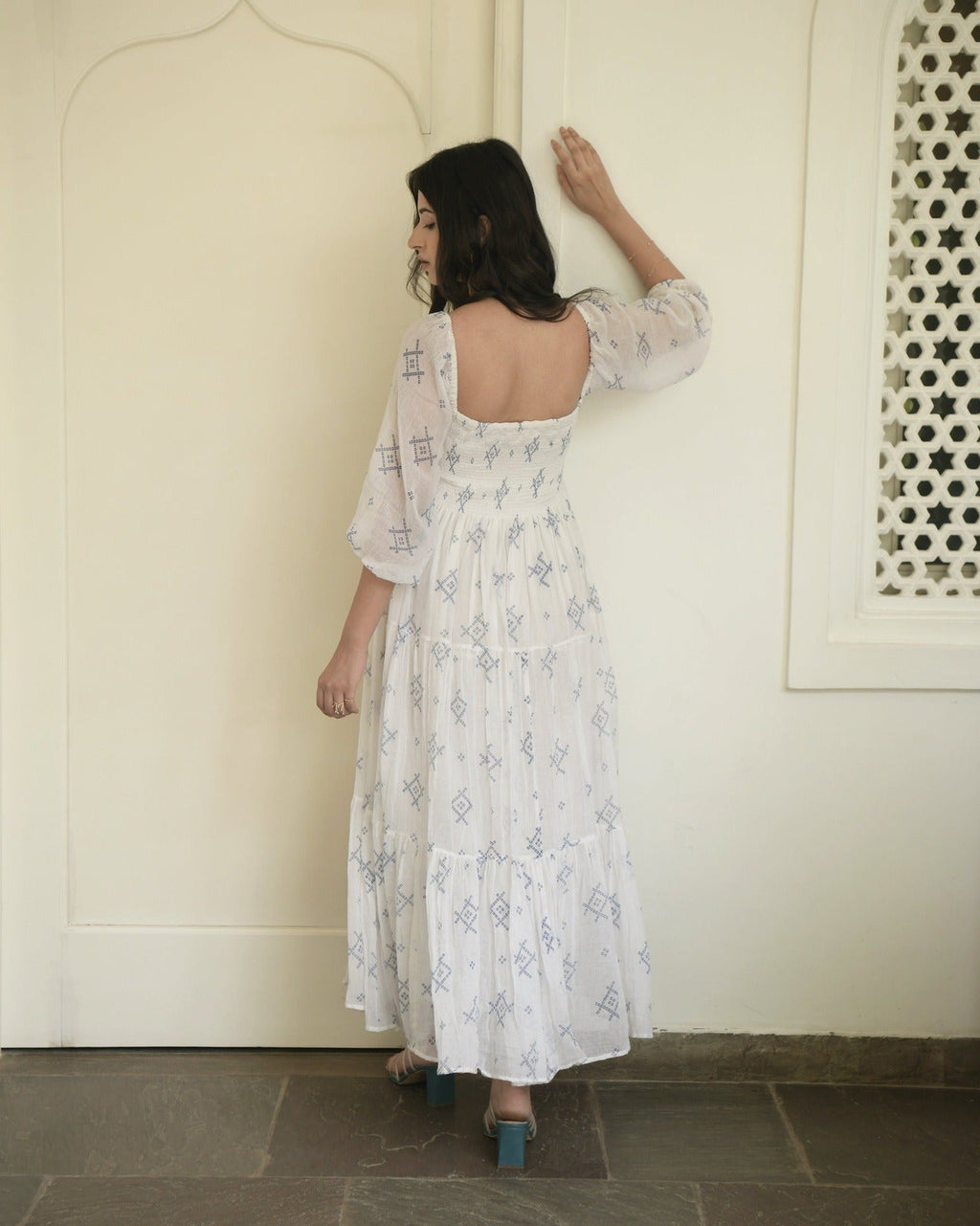 White Cotton Tiered Dress at Kamakhyaa by Taro. This item is Best Selling, Evening Wear, FB ADS JUNE, Handwoven cotton, Indo-Western, July Sale, July Sale 2023, Natural, Prints, Regular Fit, Tiered Dresses, White, Wildflower Taro, Womenswear