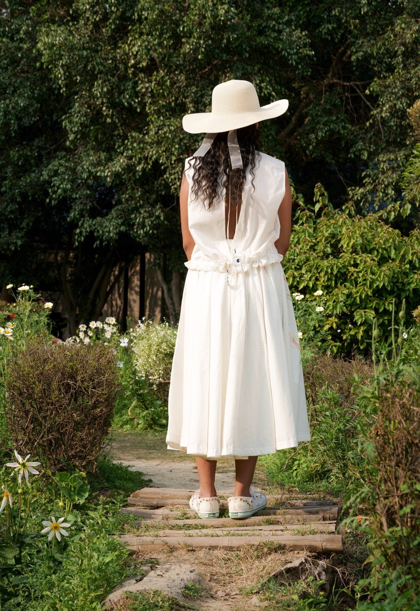 White Cotton circular skirt at Kamakhyaa by Ahmev. This item is Batik, Casual Wear, Cotton, Fitted At Waist, Hanpainted, July Sale, July Sale 2023, Midi Skirts, Natural, Prints, Skirts, White, Womenswear