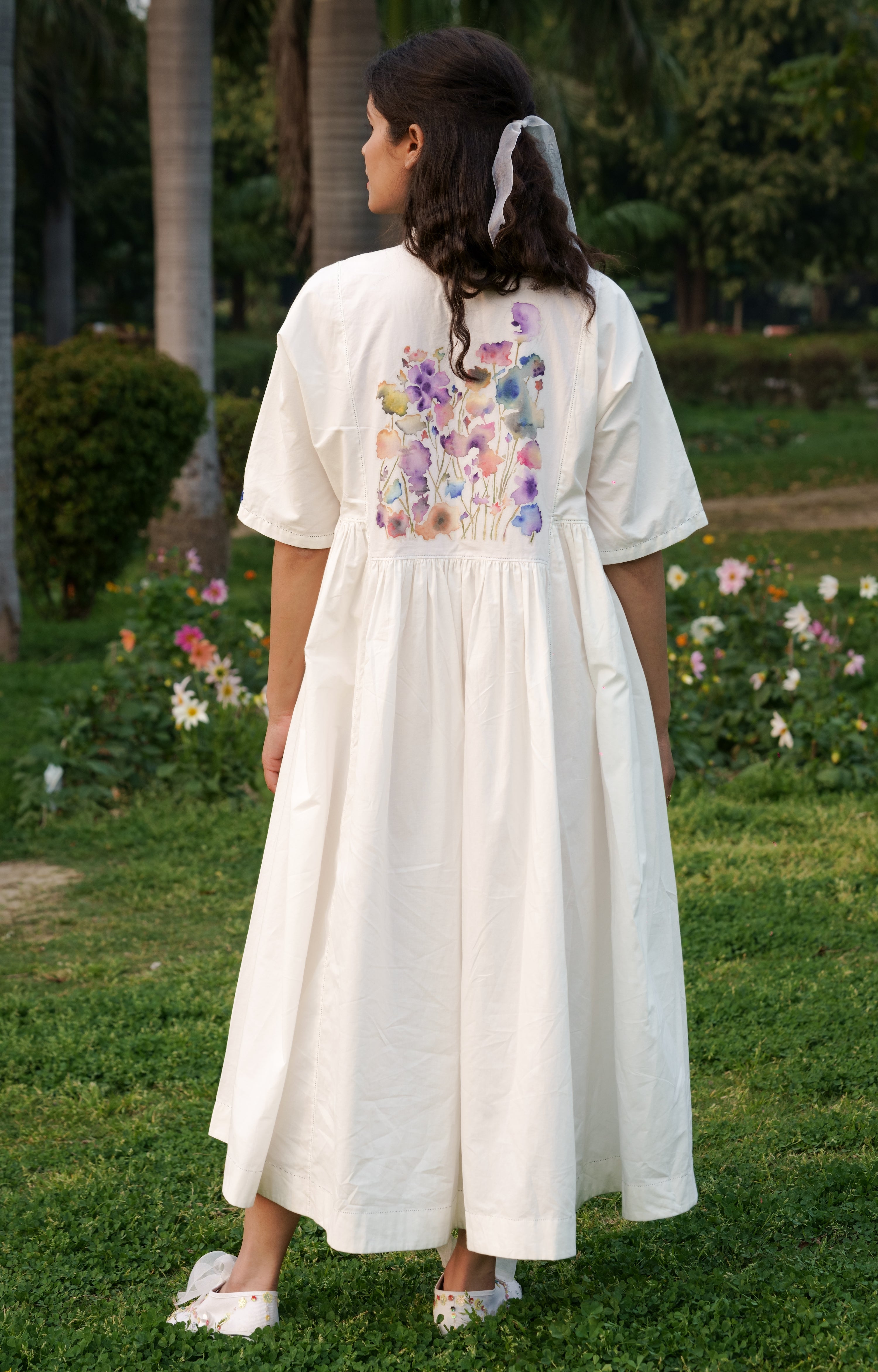 White Dress at Kamakhyaa by Ahmev. This item is Batik, Casual Wear, Cotton, Embroidered, FB ADS JUNE, Handpainted, July Sale, July Sale 2023, Midi Dresses, Natural, Prints, Relaxed Fit, Shirt Dresses, White, Womenswear