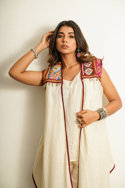 White Embroidered Cotton Shrug at Kamakhyaa by Keva. This item is 100% cotton, Best Selling, Cape, Fusion Wear, Less than $50, Natural, New, Off-white, Overlays, Relaxed Fit, Saba, Shrugs, Solids, White, Womenswear