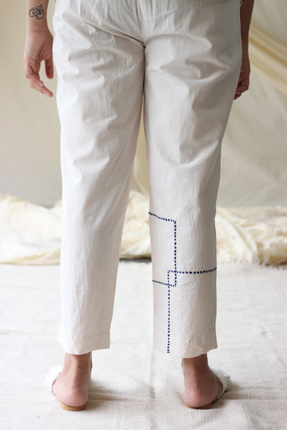 White Embroidered Pants at Kamakhyaa by Chambray & Co.. This item is Casual Wear, Cotton, Embroidered, Natural, Pants, Regular Fit, Solids, White, Womenswear