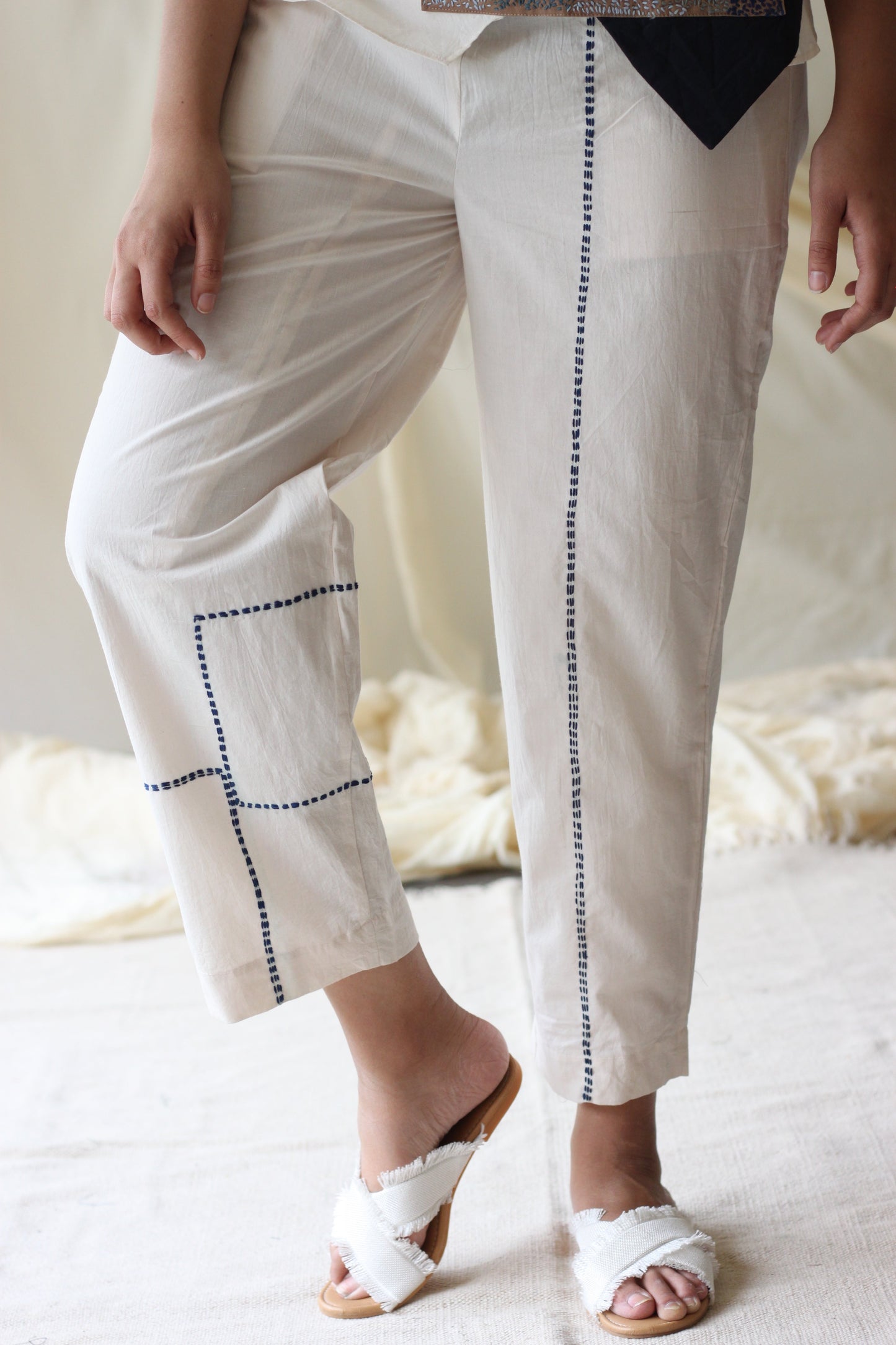 White Embroidered Pants at Kamakhyaa by Chambray & Co.. This item is Casual Wear, Cotton, Embroidered, Natural, Pants, Regular Fit, Solids, White, Womenswear