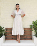 White Embroidered Silk Maxi Dress at Kamakhyaa by Taro. This item is Best Selling, Dusk To Dawn, Embroidered, Evening Wear, FB ADS JUNE, July Sale, July Sale 2023, Midi Dresses, Modal silk, Natural, Regular Fit, Shirt Dresses, Silk, White, Womenswear