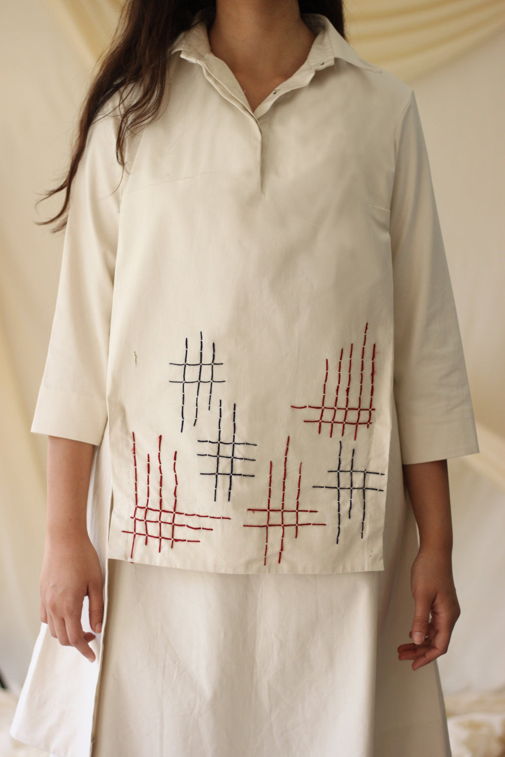 White Embroidered Tunic Top at Kamakhyaa by Chambray & Co.. This item is Casual Wear, Cotton, Natural, Purple, Regular Fit, Solids, Tops, Tunic Tops, White, Womenswear