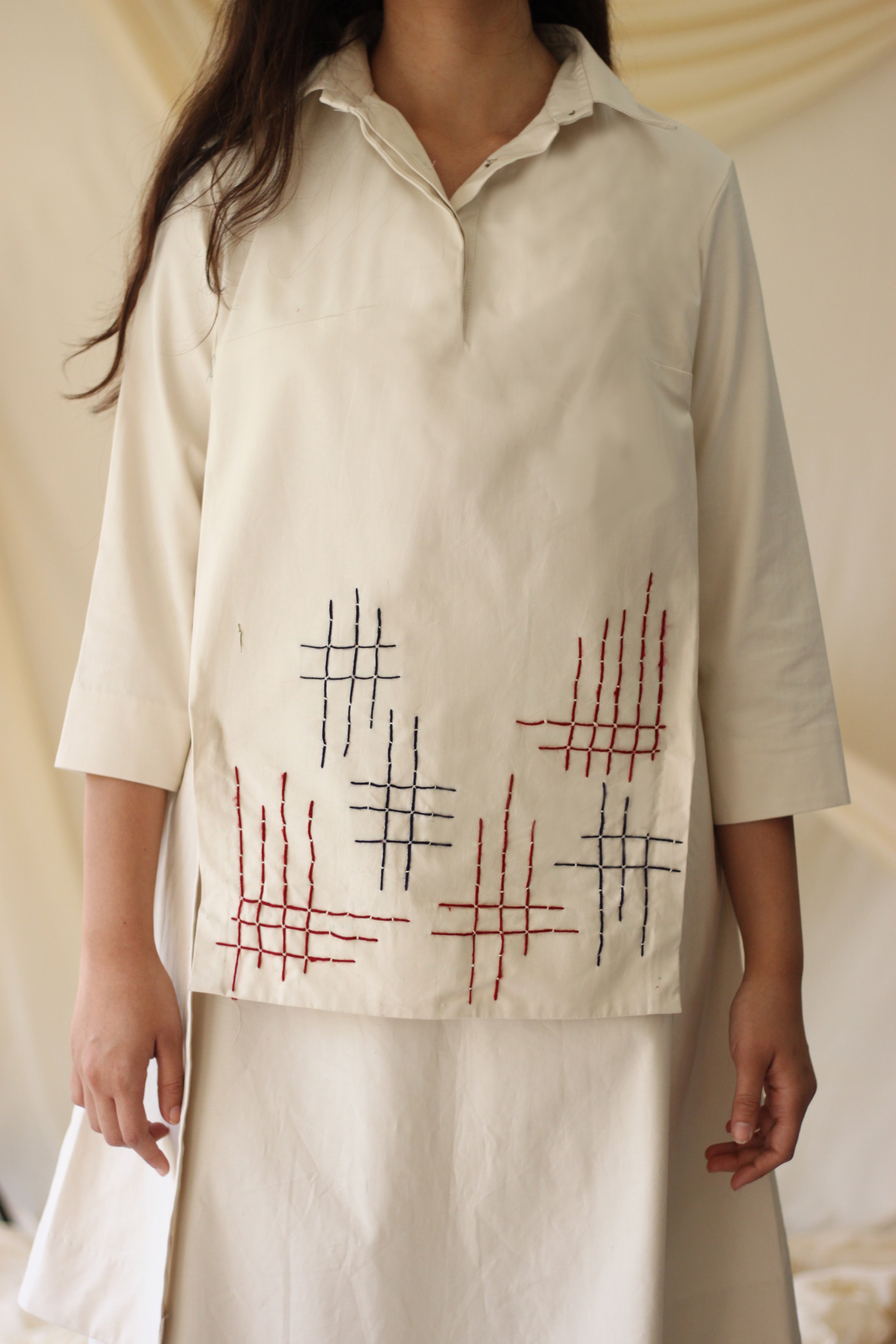 White Embroidered Tunic Top at Kamakhyaa by Chambray & Co.. This item is Casual Wear, Cotton, Natural, Purple, Regular Fit, Solids, Tops, Tunic Tops, White, Womenswear