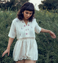 White Floral Embroidered Tunic Top at Kamakhyaa by The Loom Art. This item is Embroidered, July Sale, July Sale 2023, Natural, Organic, Party Wear, Peplum Tops, Permanent Vacation, Regular Fit, Tops, White, Womenswear