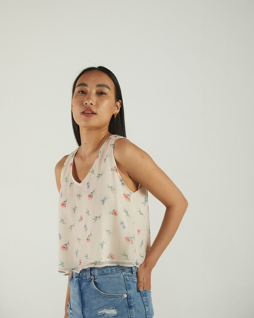 White Floral Sleeveless Crop Top at Kamakhyaa by Reistor. This item is Bemberg, Casual Wear, Chiffon, Crop Tops, Natural, Prints, Tops, White, Womenswear