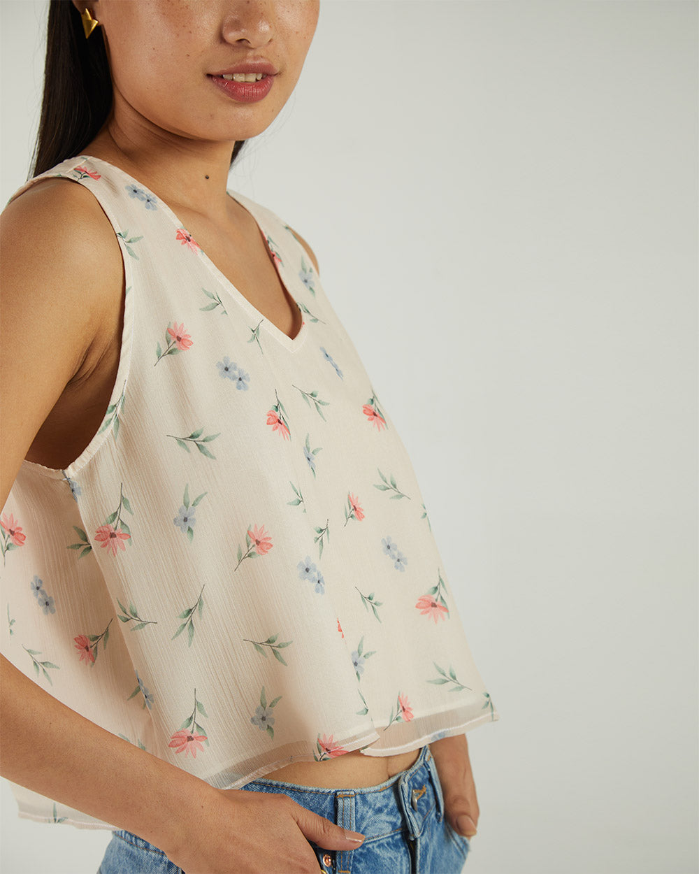 White Floral Sleeveless Crop Top at Kamakhyaa by Reistor. This item is Bemberg, Casual Wear, Chiffon, Crop Tops, Natural, Prints, Tops, White, Womenswear