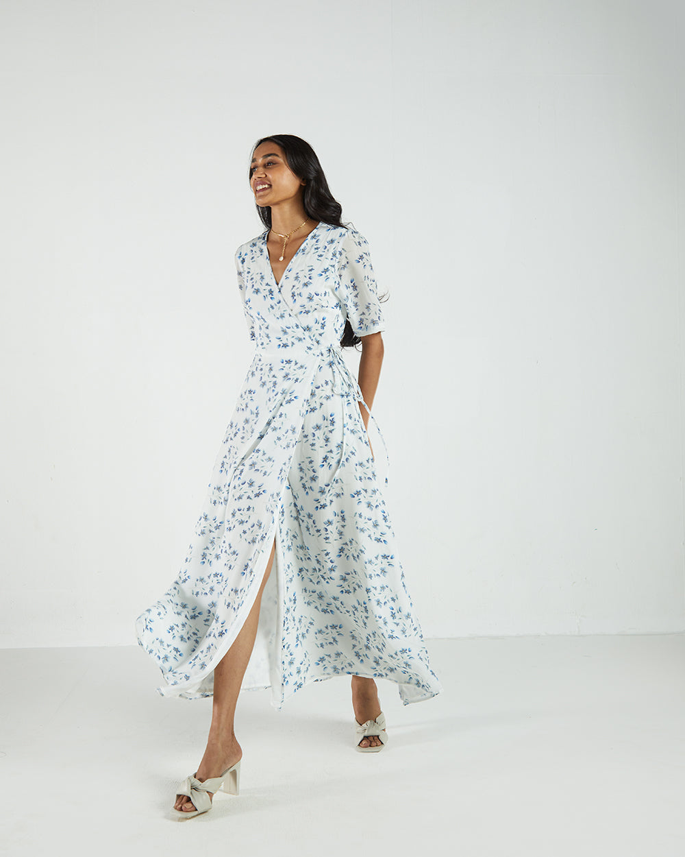 White Floral Wrap Dress at Kamakhyaa by Reistor. This item is Bemberg, Casual Wear, FB ADS JUNE, Natural, Printed Selfsame, Prints, White, Womenswear, Wrap Dresses