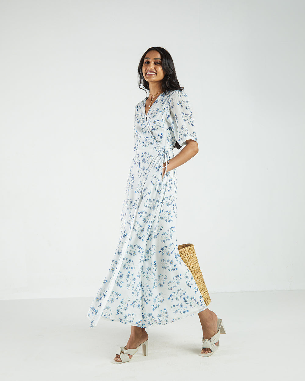 White Floral Wrap Dress at Kamakhyaa by Reistor. This item is Bemberg, Casual Wear, FB ADS JUNE, Natural, Printed Selfsame, Prints, White, Womenswear, Wrap Dresses