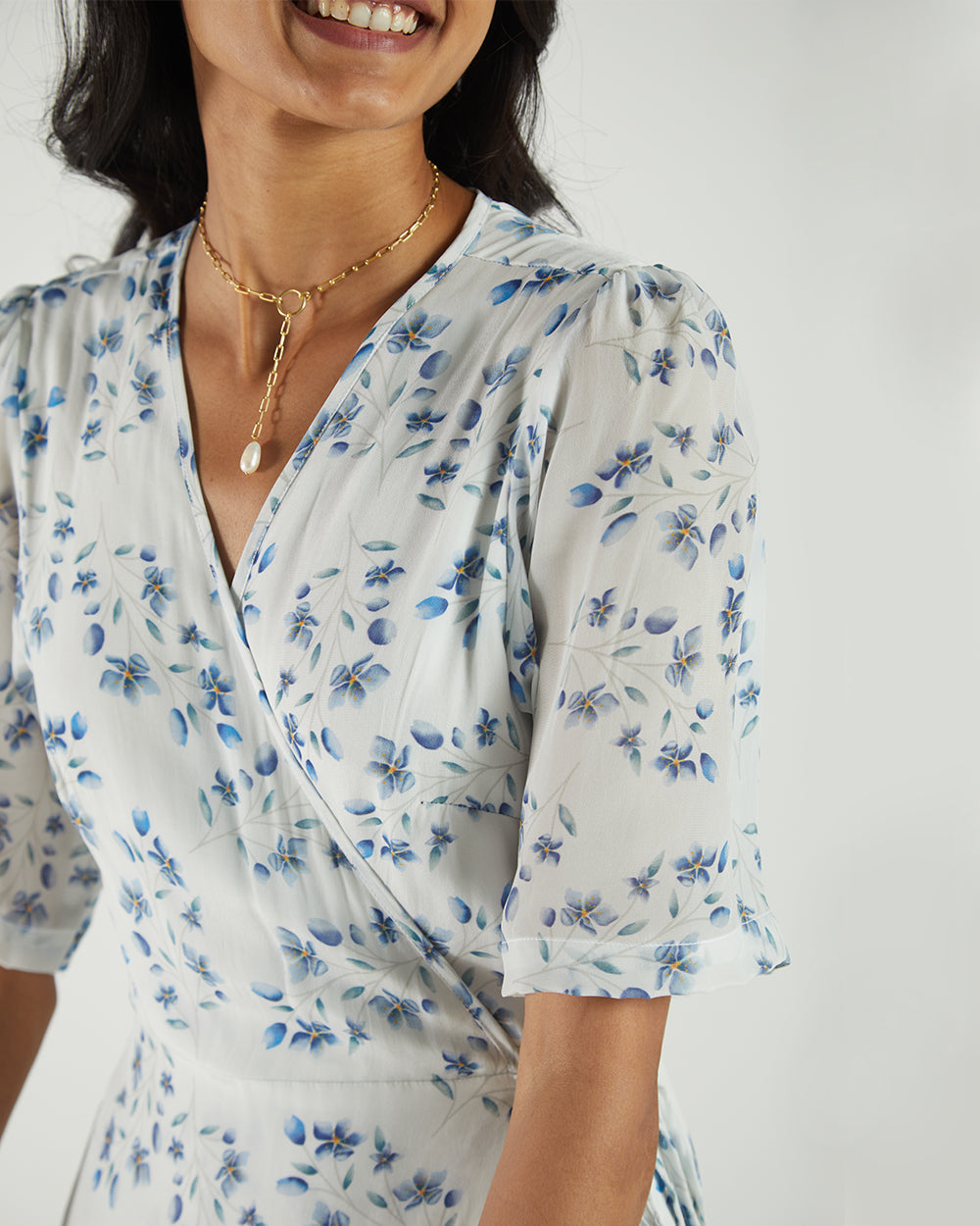 White Floral Wrap Dress at Kamakhyaa by Reistor. This item is Bemberg, Casual Wear, FB ADS JUNE, Natural, Printed Selfsame, Prints, White, Womenswear, Wrap Dresses