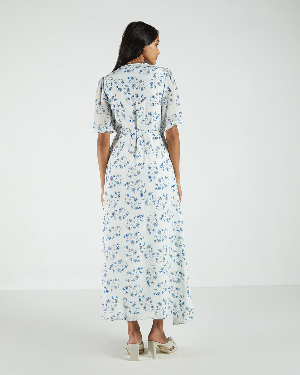 White Floral Wrap Dress at Kamakhyaa by Reistor. This item is Bemberg, Casual Wear, FB ADS JUNE, Natural, Printed Selfsame, Prints, White, Womenswear, Wrap Dresses