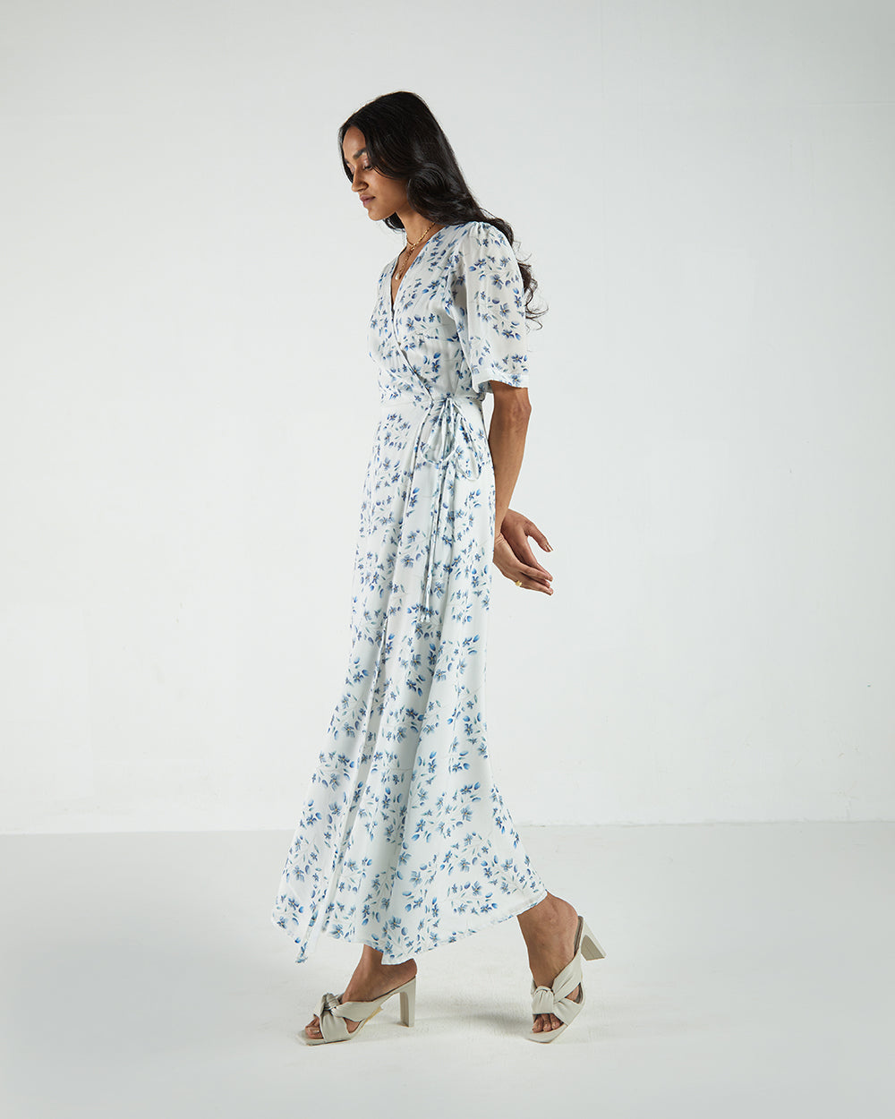 White Floral Wrap Dress at Kamakhyaa by Reistor. This item is Bemberg, Casual Wear, FB ADS JUNE, Natural, Printed Selfsame, Prints, White, Womenswear, Wrap Dresses