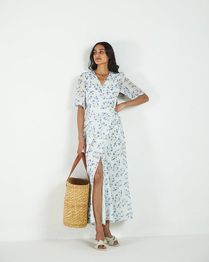 White Floral Wrap Dress at Kamakhyaa by Reistor. This item is Bemberg, Casual Wear, FB ADS JUNE, Natural, Printed Selfsame, Prints, White, Womenswear, Wrap Dresses