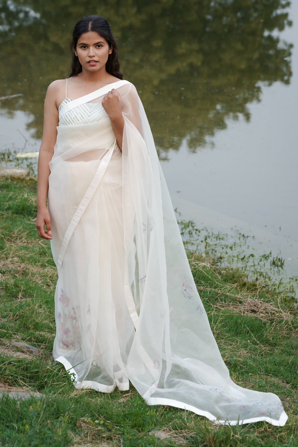 White Hand Embroidered Saree at Kamakhyaa by Ahmev. This item is Casual Wear, Cotton, Indian Wear, July Sale, July Sale 2023, Natural, Relaxed Fit, Sarees, Silk Organza, Stripes, White, Womenswear