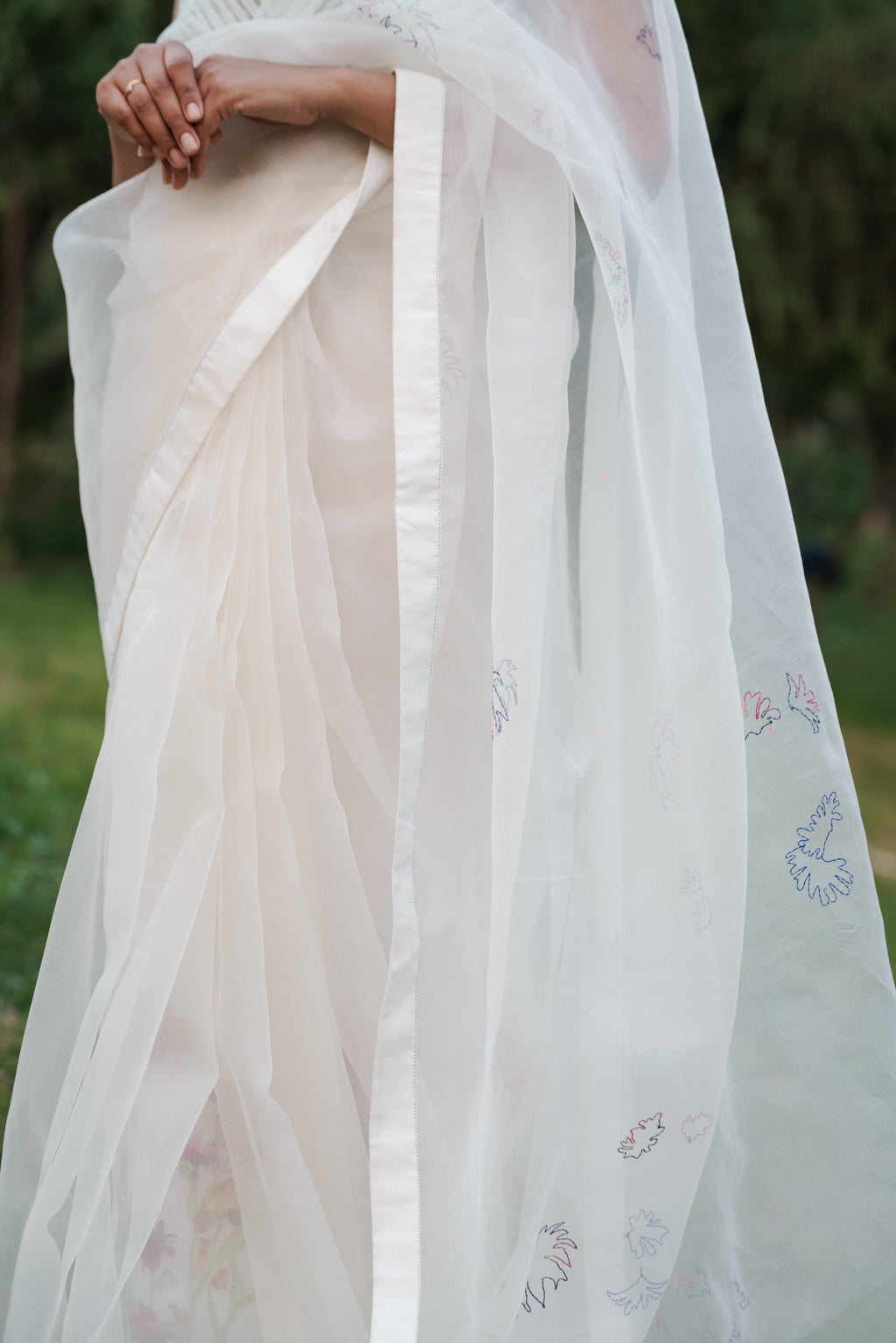 White Hand Embroidered Saree at Kamakhyaa by Ahmev. This item is Casual Wear, Cotton, Indian Wear, July Sale, July Sale 2023, Natural, Relaxed Fit, Sarees, Silk Organza, Stripes, White, Womenswear