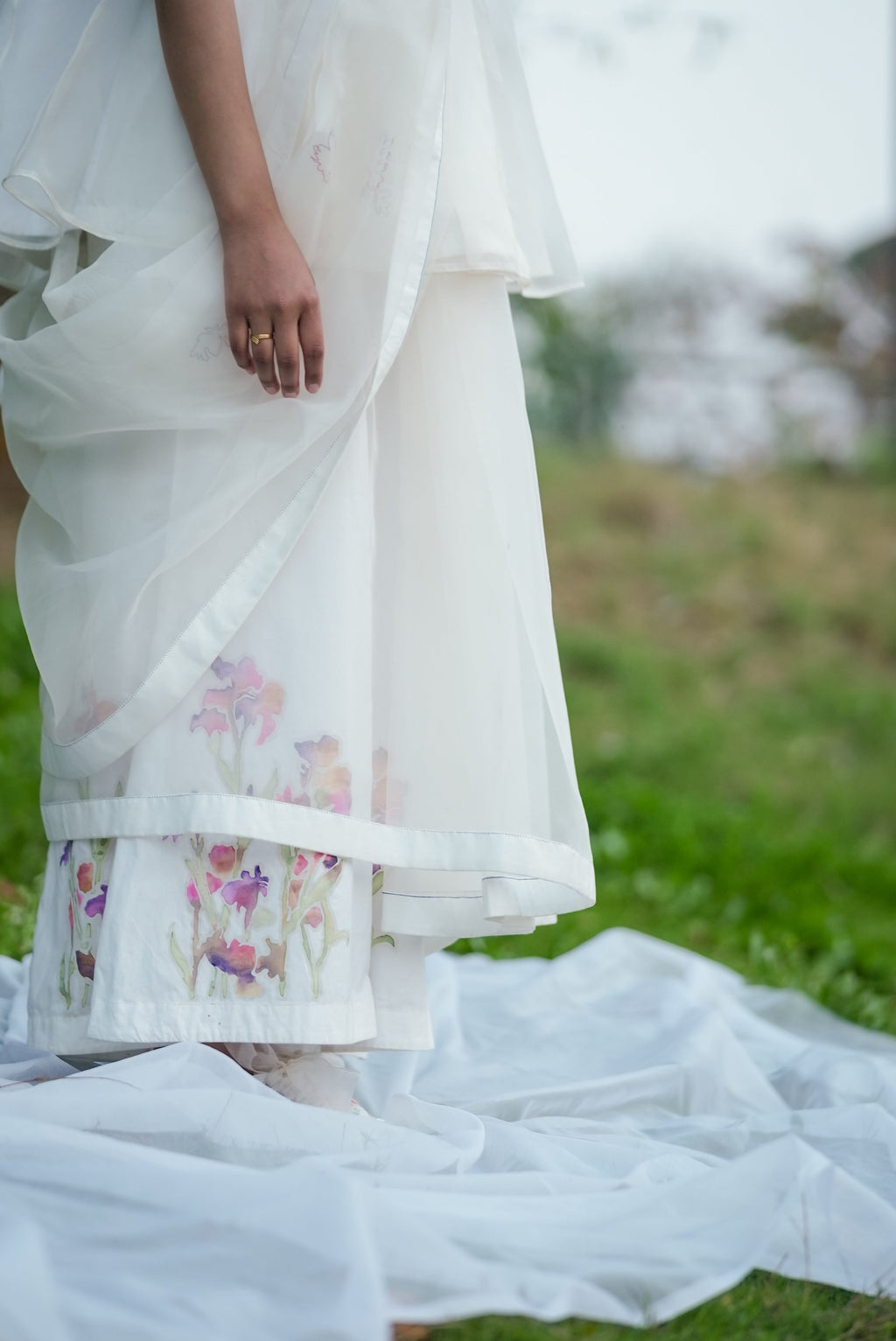 White Hand Embroidered Saree at Kamakhyaa by Ahmev. This item is Casual Wear, Cotton, Indian Wear, July Sale, July Sale 2023, Natural, Relaxed Fit, Sarees, Silk Organza, Stripes, White, Womenswear