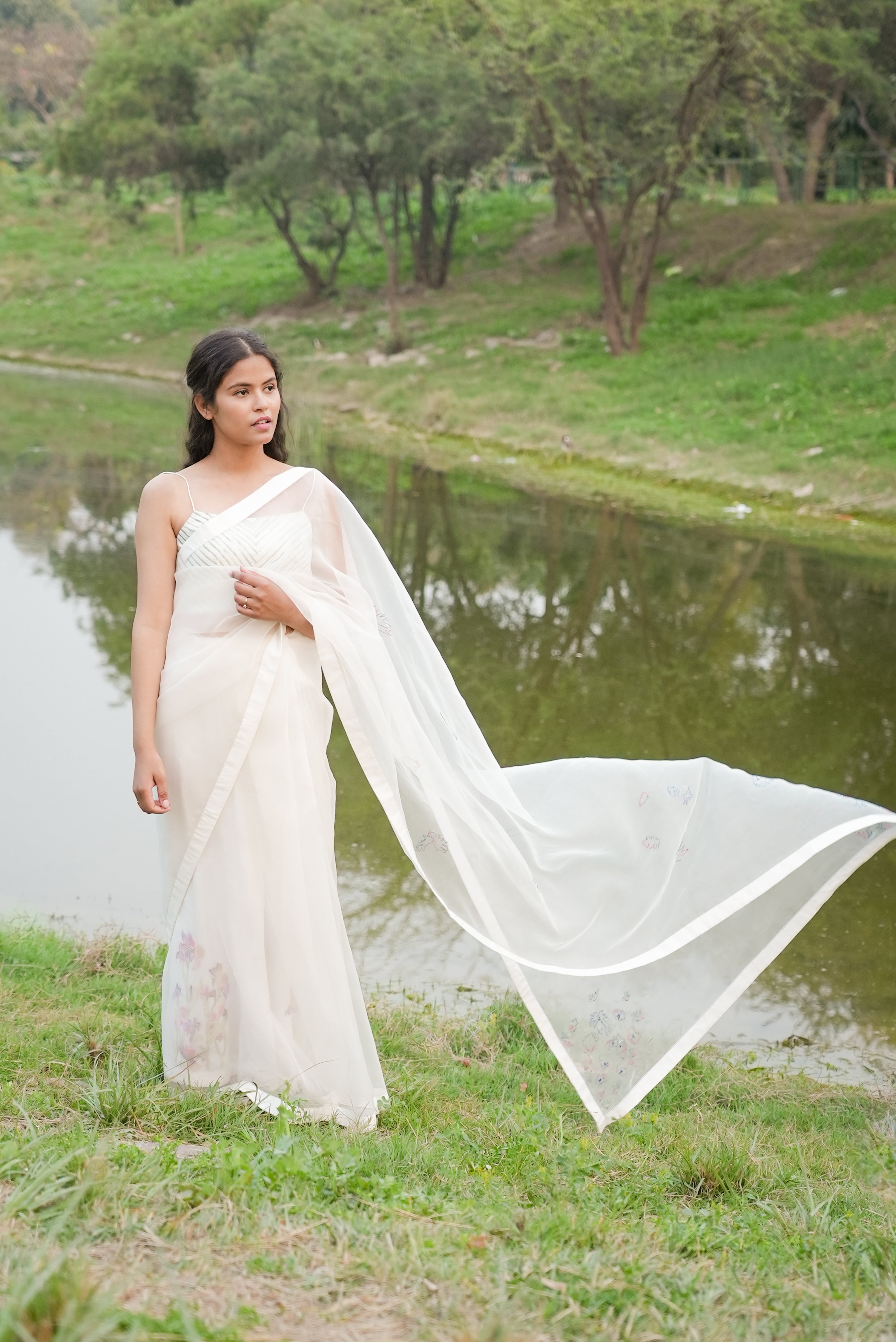 White Hand Embroidered Saree at Kamakhyaa by Ahmev. This item is Casual Wear, Cotton, Indian Wear, July Sale, July Sale 2023, Natural, Relaxed Fit, Sarees, Silk Organza, Stripes, White, Womenswear