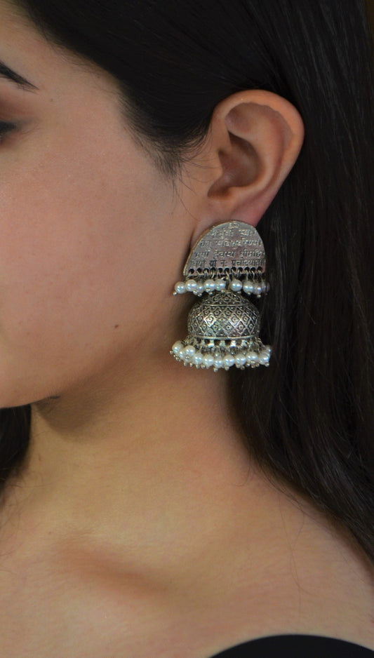 White Jhumkas Shlok at Kamakhyaa by House Of Heer. This item is Alloy Metal, Festive Jewellery, Festive Wear, Free Size, jewelry, July Sale, July Sale 2023, Long Earrings, Natural, Pearl, Solids, Textured, White